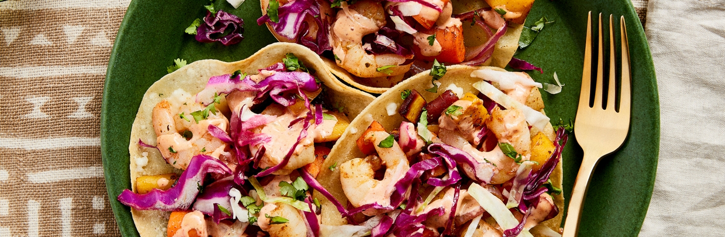 Shrimp and Roasted Carrot Tostadas with Crunchy Slaw and Chipotle Crema