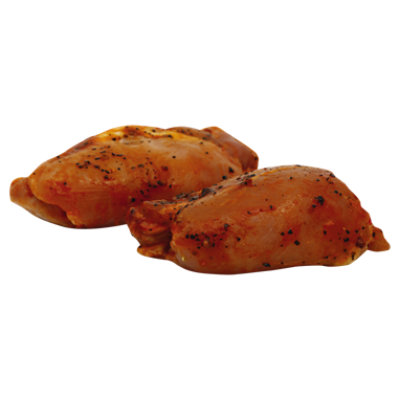 Chicken Thighs Bone In Seasoned Service Case - 1 Lb - Image 1