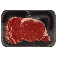 Meat Counter Beef USDA Choice Ribeye Steak Bone In Herb Crusted Service Case - 2.50 LB - Image 1