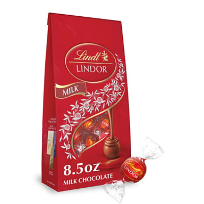 Lindt LINDOR Milk Chocolate Candy Truffles Bag - 8.5 Oz - Image 1