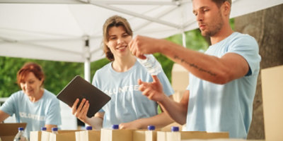  People volunteering during a food donation event