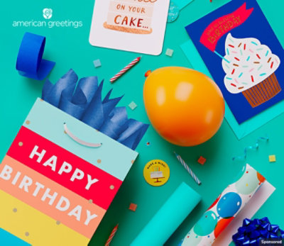 Birthday cards, gift packaging and an inflated balloon sit on a stylized turquoise background.