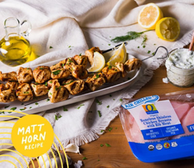 Matt Horn Recipe. Grilled Chicken Lemon Skewers with Tzatziki Sauce next to O Organics Boneless Skinless Chicken Breasts with Rib Meat.