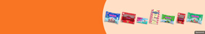 Brachs, Sweetarts, and other candy products on an orange background.