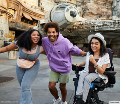 3 people at Star Wars: Galaxy's Edge.