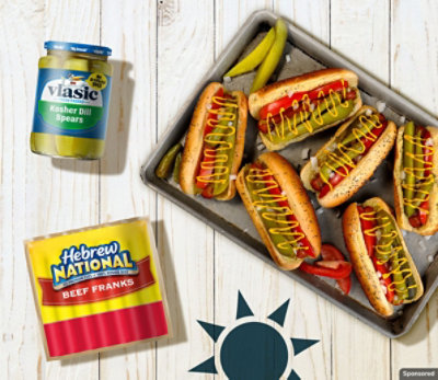 Chicago Hot Dogs on a platter with Hebrew National hot dogs and Vlasic pickles.