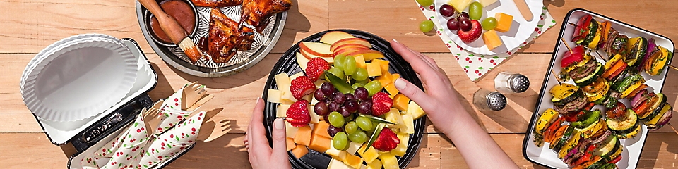 Deli fruit and cheese tray, grilled chicken and grilled veggie kabobs