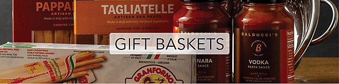 Various boxes of pasta and jars of pasta sauce.