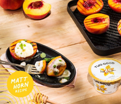 Matt Horn Recipe. Grilled Peaches next to Two Good vanilla yogurt.
