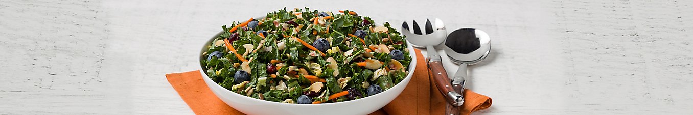 Kale salad on tabletop.