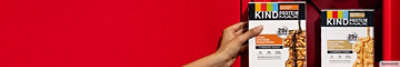KIND Protein Max bars in a 4-pack box on red background.