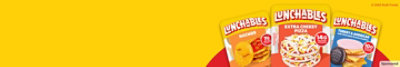 Three Lunchables packs fanning out over red and yellow background.