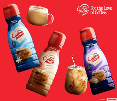 Coffee mate packages on a red background.