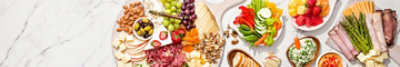 Charcuterie board with fruits, meats and cheeses	