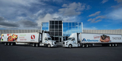 Albertsons freight truck in gas station.