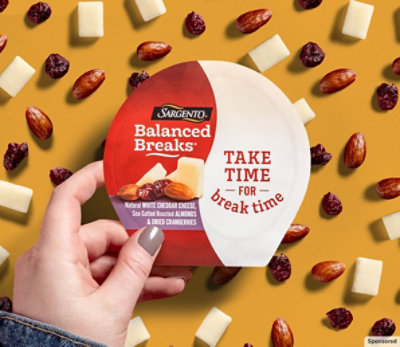 Sargento Balanced Breaks snack shown with cheese and nuts on yellow background.