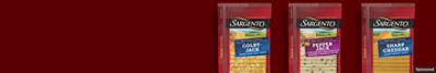 Sargento Colby-Jack, Pepper Jack, and Sharp Cheddar Cheese packages on a maroon background.