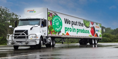 Shaw's freight truck on the road.