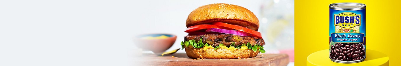 A plant-based burger and a can of Bush's Best black beans