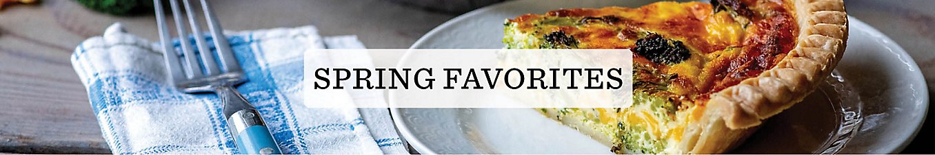 Text that reads "Spring Favorites" over an image of a slice of quiche on a plate next to a fork and napkin.