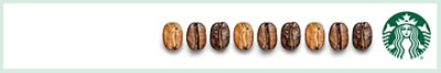 Coffee beans on white background with a Starbucks logo.