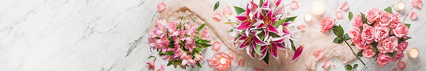 Pink roses, lily stargazers, and alstroemerias